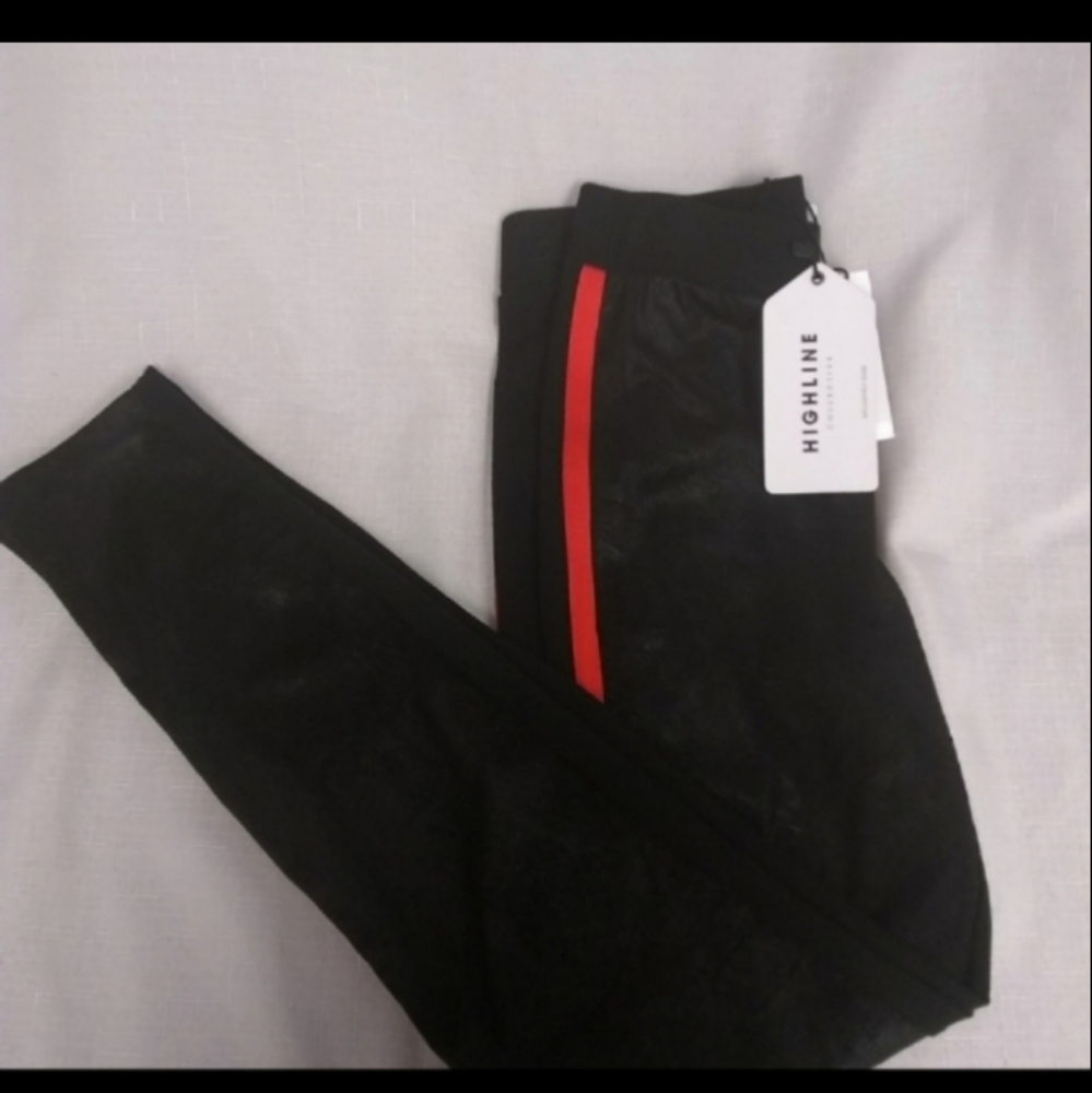 Nwt black leggings  w/ orange side stripe